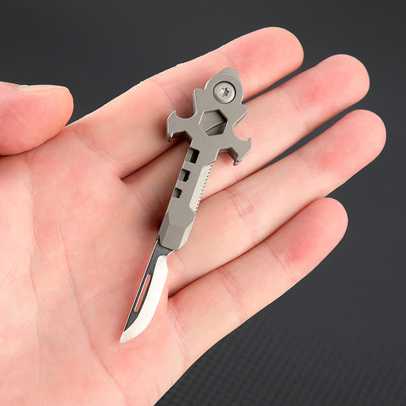 Portachiavi con mini coltello pieghevole multifunzionale in titanio Cross