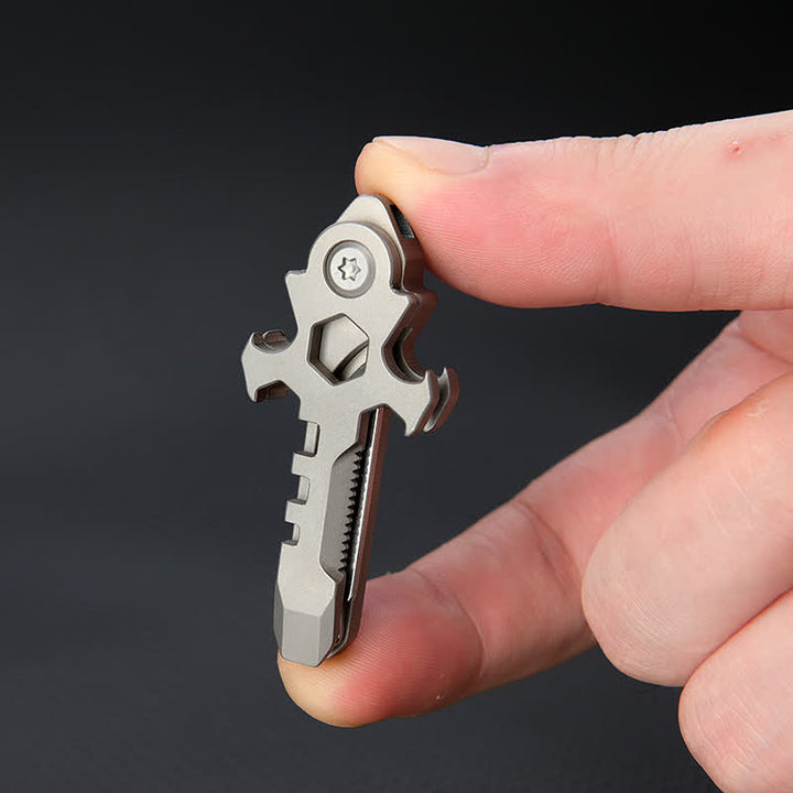 Portachiavi con mini coltello pieghevole multifunzionale in titanio Cross