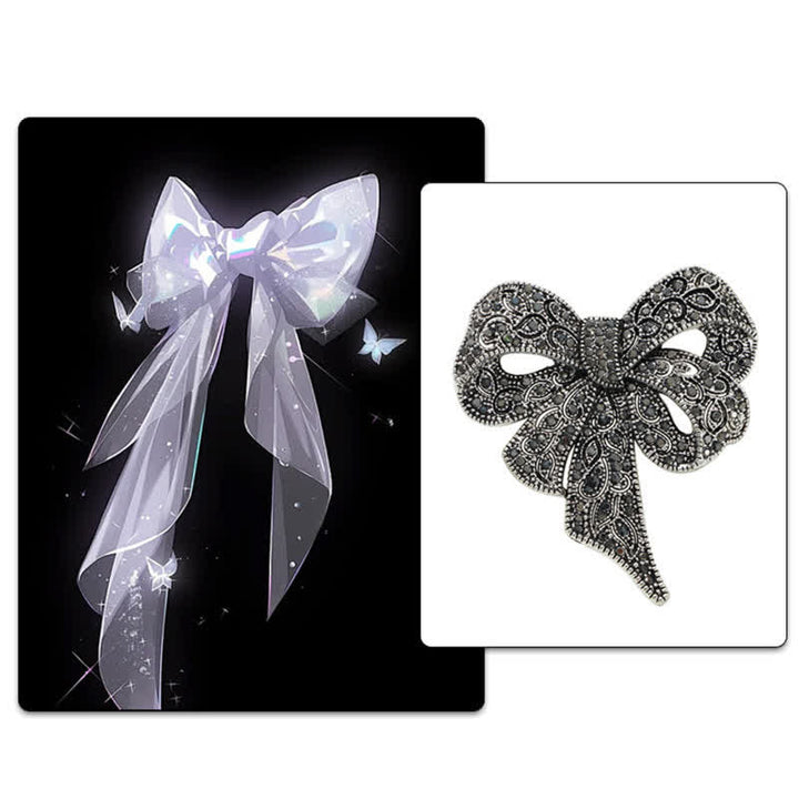 Spilla da donna in argento antico a forma di fiocco con strass