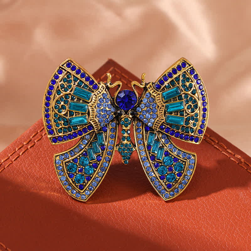 Spilla da donna con decorazione a farfalla e cristalli di strass