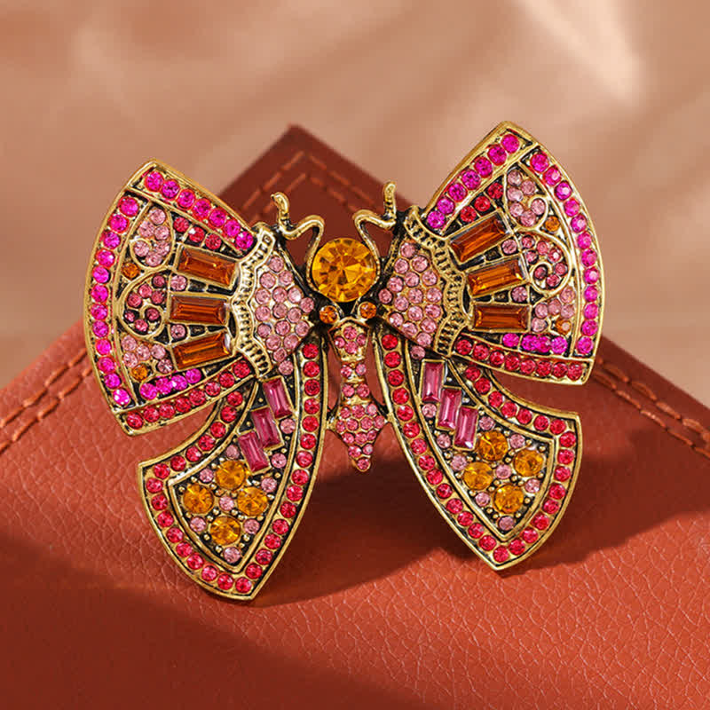 Spilla da donna con decorazione a farfalla e cristalli di strass