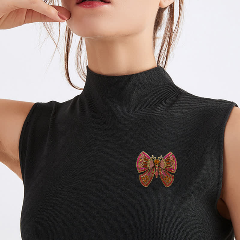 Spilla da donna con decorazione a farfalla e cristalli di strass