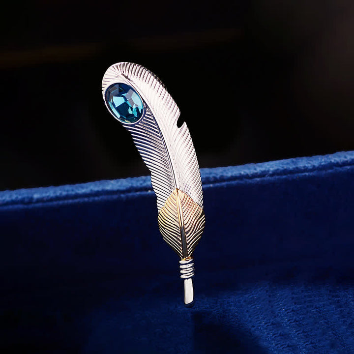 Spilla unisex a forma di piuma in cristallo blu finto