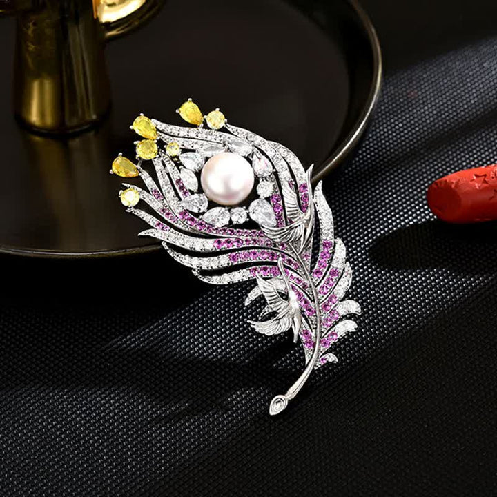 Spilla unisex a forma di piuma con perle di strass rosa e gialli