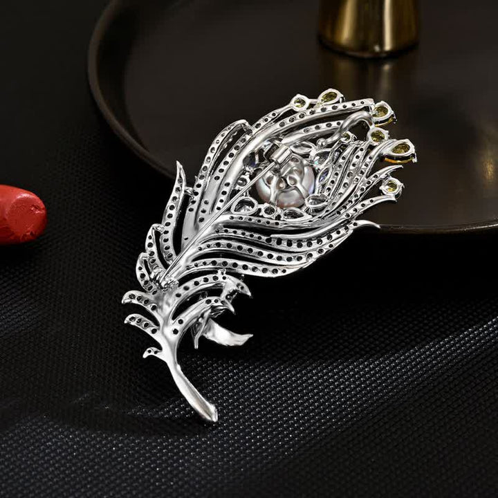 Spilla unisex a forma di piuma con perle di strass rosa e gialli