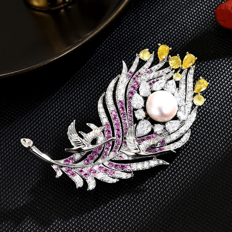 Spilla unisex a forma di piuma con perle di strass rosa e gialli