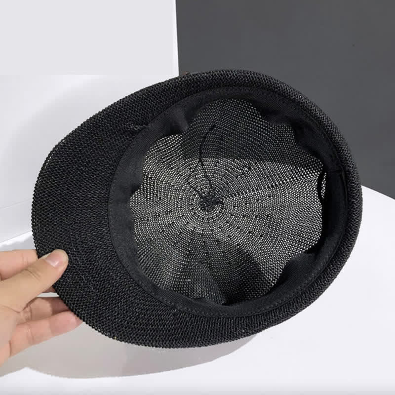 Cappello da spiaggia in paglia con decorazione in pelle intrecciata da donna