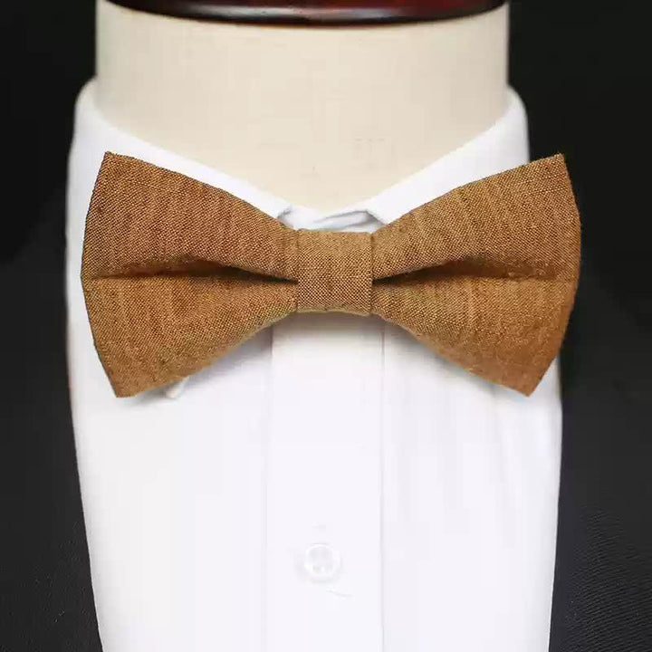 Papillon da uomo in lino tinta unita color oro scuro
