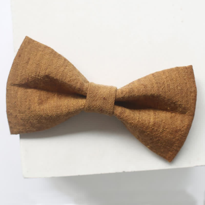 Papillon da uomo in lino tinta unita color oro scuro