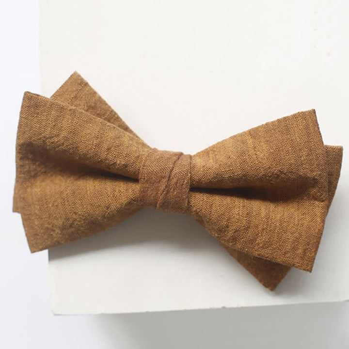 Papillon da uomo in lino tinta unita color oro scuro