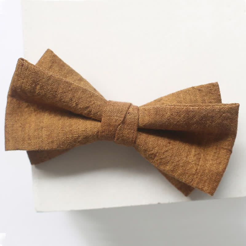 Papillon da uomo in lino tinta unita color oro scuro