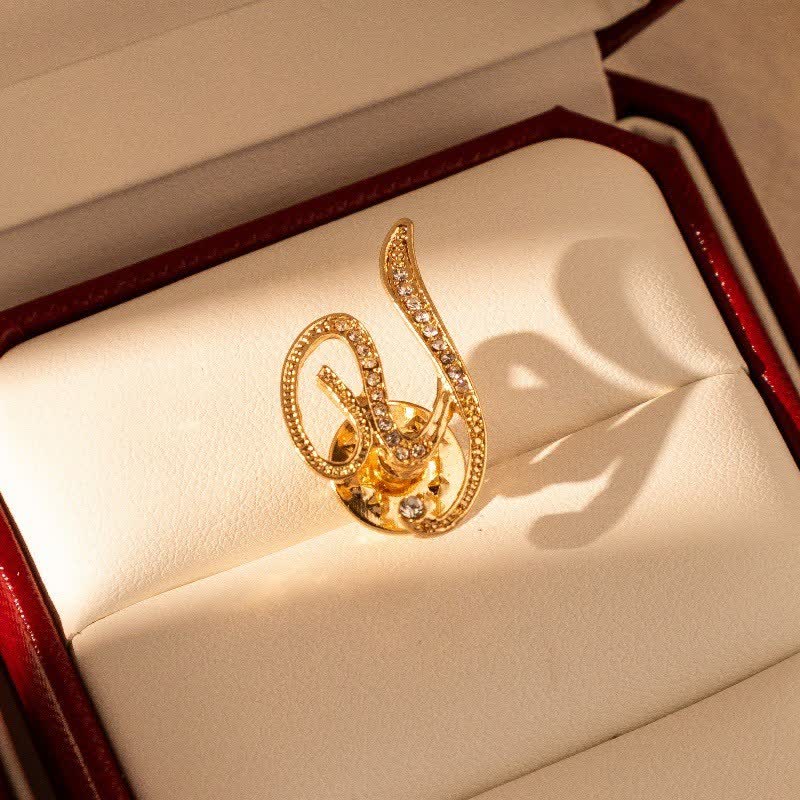 Spilla con lettera iniziale in oro 26 dell'alfabeto con strass