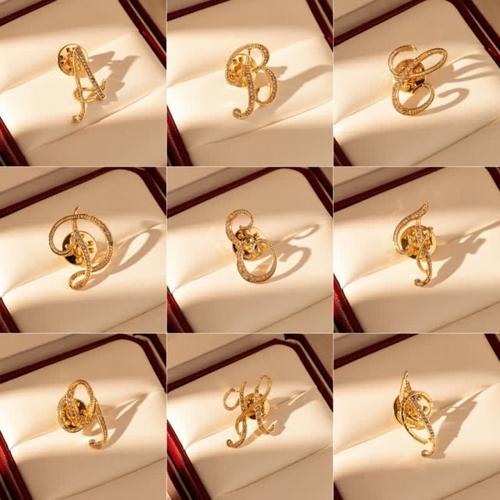 Spilla con lettera iniziale in oro 26 dell'alfabeto con strass