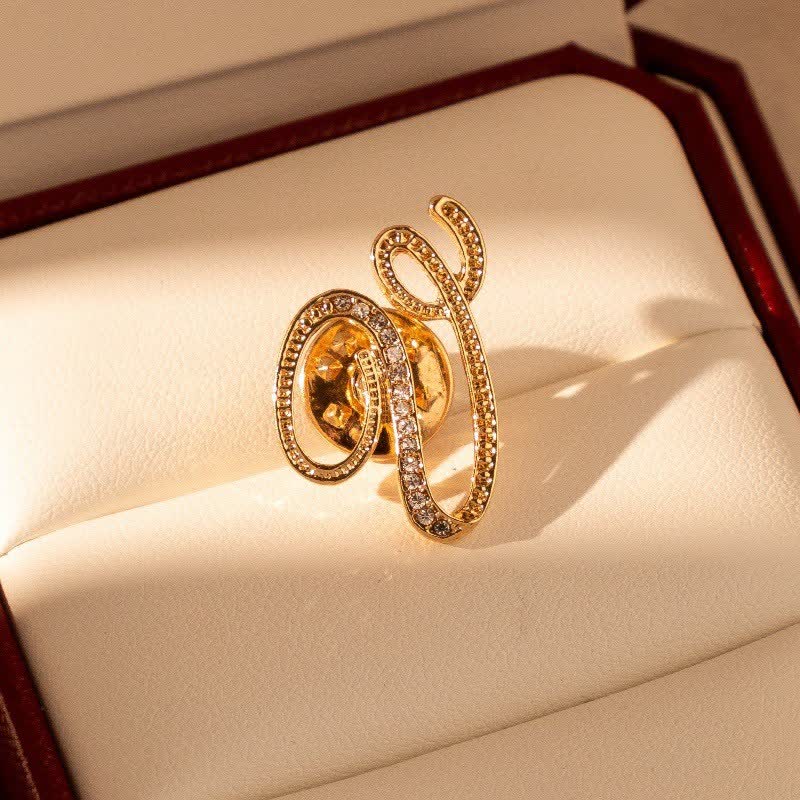Spilla con lettera iniziale in oro 26 dell'alfabeto con strass