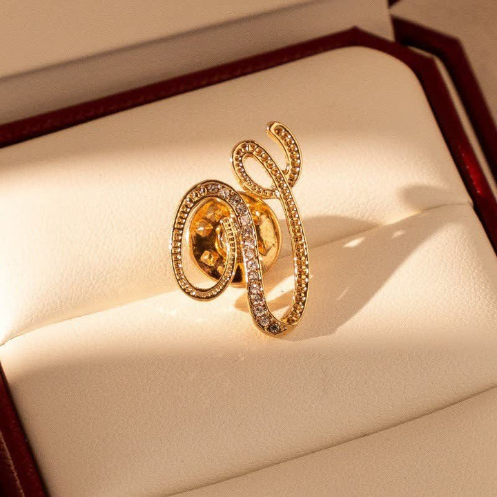 Spilla con lettera iniziale in oro 26 dell'alfabeto con strass