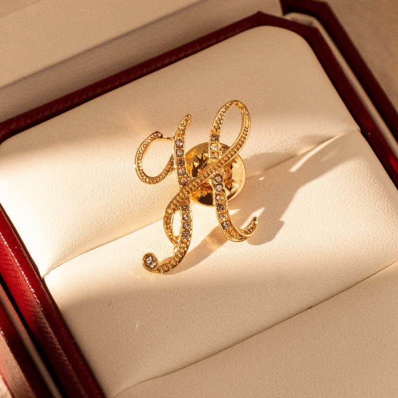 Spilla con lettera iniziale in oro 26 dell'alfabeto con strass