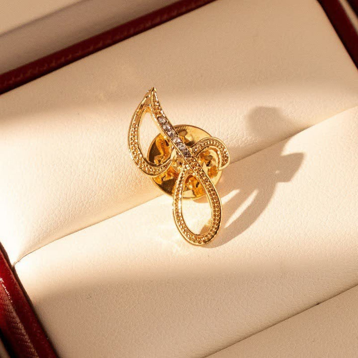 Spilla con lettera iniziale in oro 26 dell'alfabeto con strass