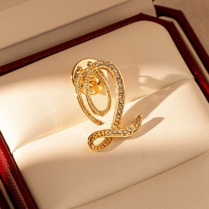 Spilla con lettera iniziale in oro 26 dell'alfabeto con strass