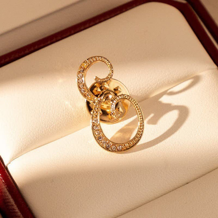 Spilla con lettera iniziale in oro 26 dell'alfabeto con strass