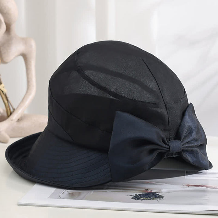 Cappello da sole pieghevole in seta con tesa larga e nodo a fiocco grande da donna
