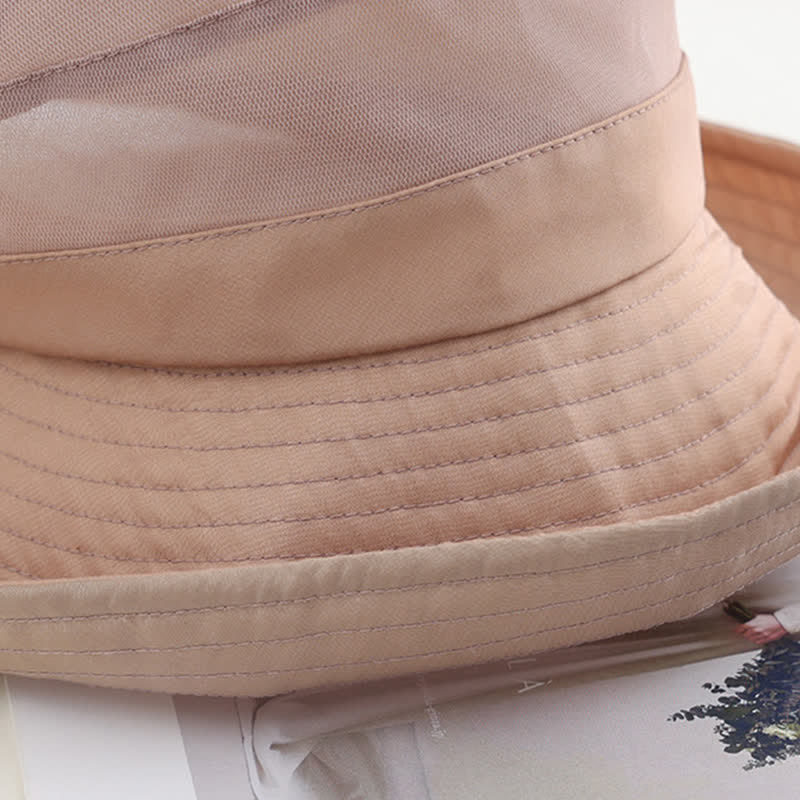 Cappello da sole pieghevole in seta con tesa larga e nodo a fiocco grande da donna