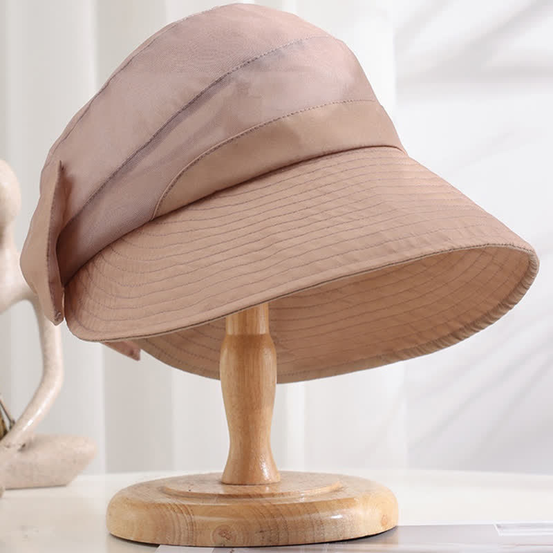 Cappello da sole pieghevole in seta con tesa larga e nodo a fiocco grande da donna