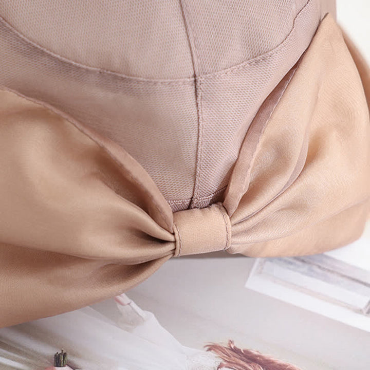 Cappello da sole pieghevole in seta con tesa larga e nodo a fiocco grande da donna