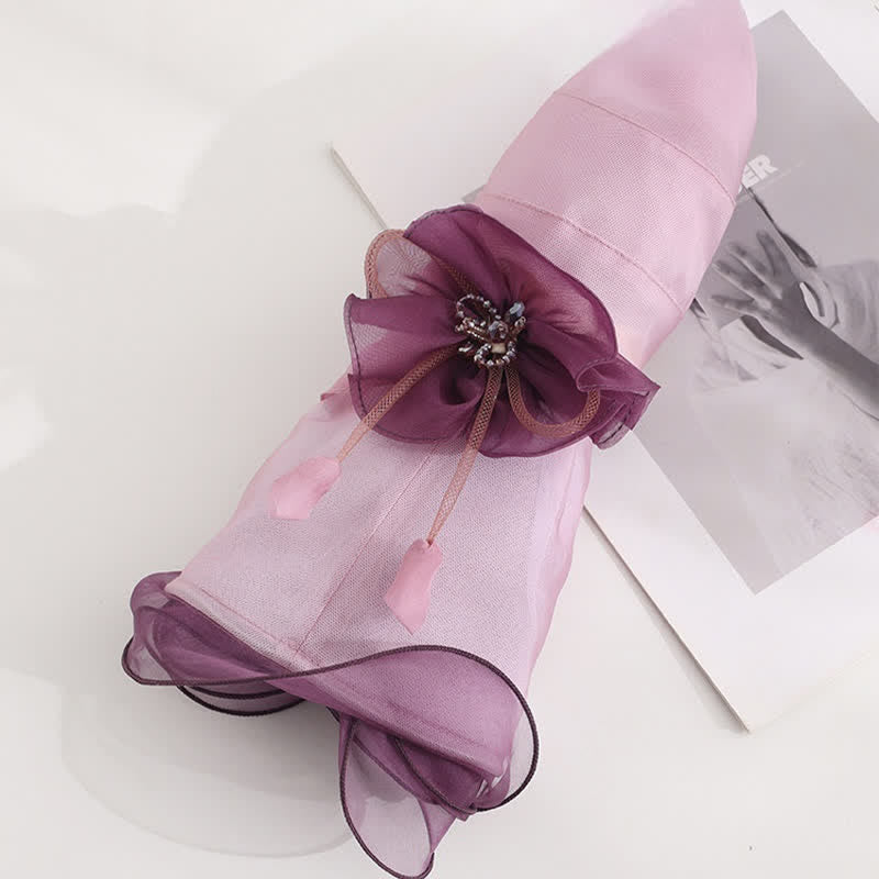 Cappello da sole da donna in seta pieghevole con tesa larga e ondulata e motivo floreale