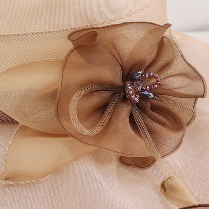 Cappello da sole da donna in seta pieghevole con tesa larga e ondulata e motivo floreale