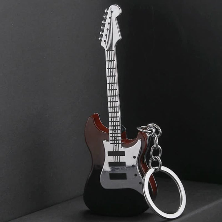 Portachiavi accendino gonfiabile a butano a forma di chitarra
