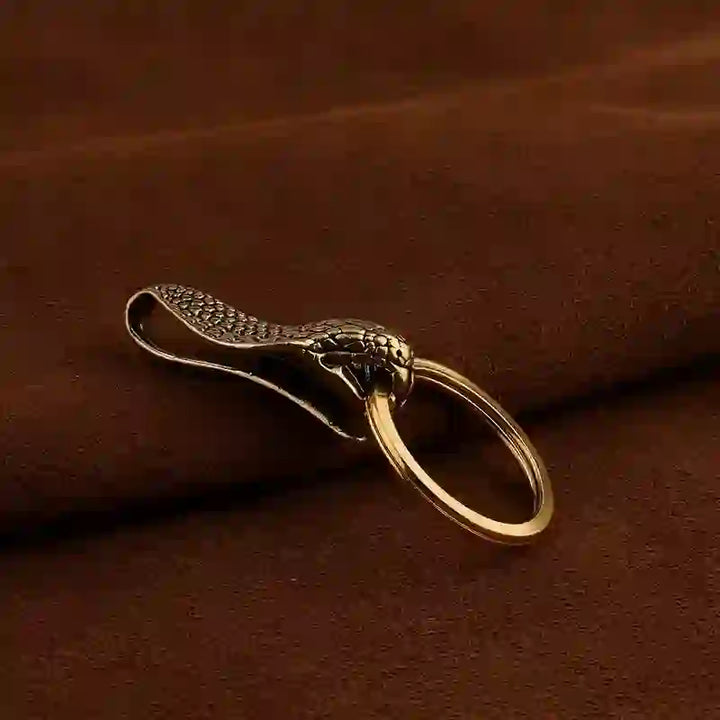 Portachiavi con clip da cintura in ottone massiccio raffigurante una testa di serpente