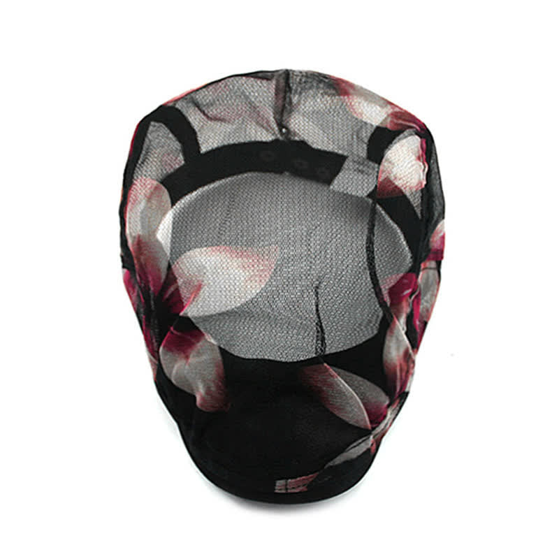 Cappello basco da donna con motivo floreale traforato in rete