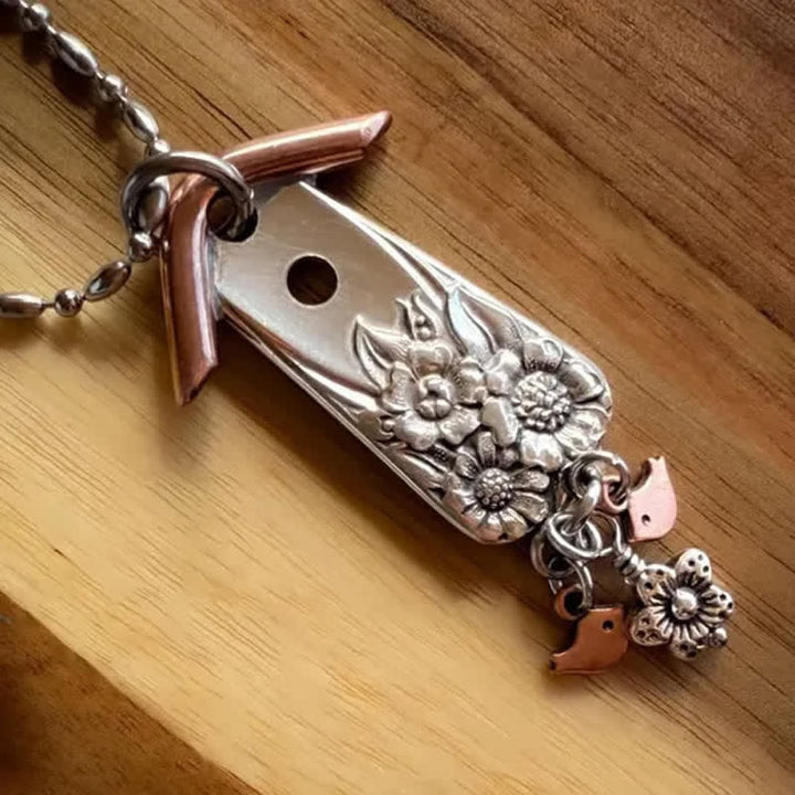 Collana placcata in argento con piccola casetta per uccelli