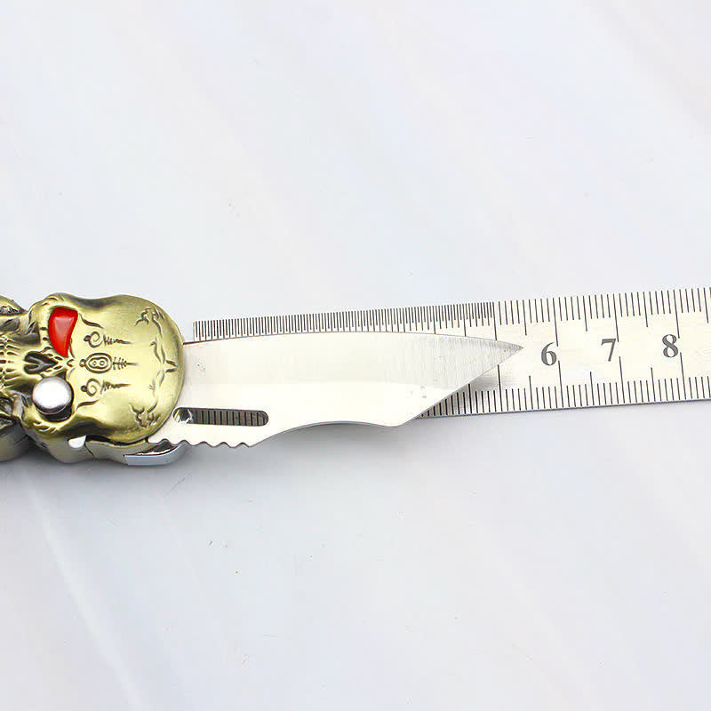 Accendino a butano ricaricabile con triplo teschio e coltello - image 11