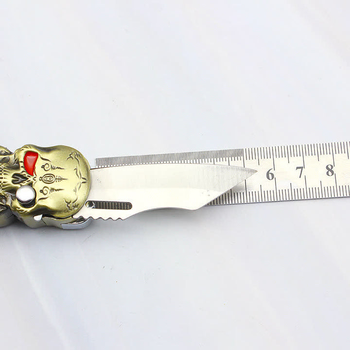 Accendino a butano ricaricabile con triplo teschio e coltello - image 11