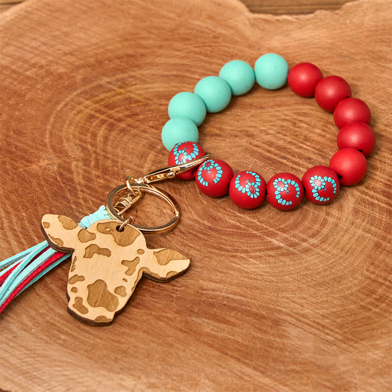 Bracciale da polso in perline di legno di mucca con nappa