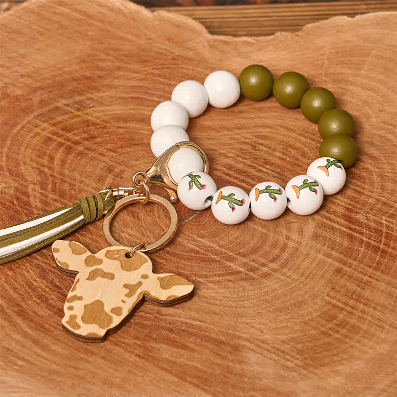 Bracciale da polso in perline di legno di mucca con nappa