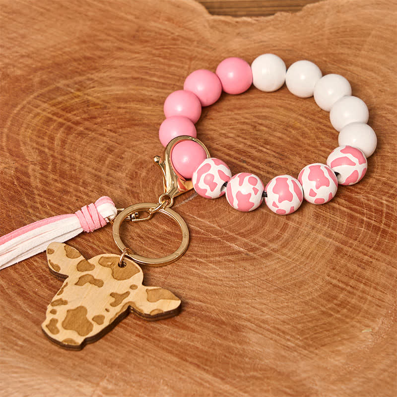 Bracciale da polso in perline di legno di mucca con nappa