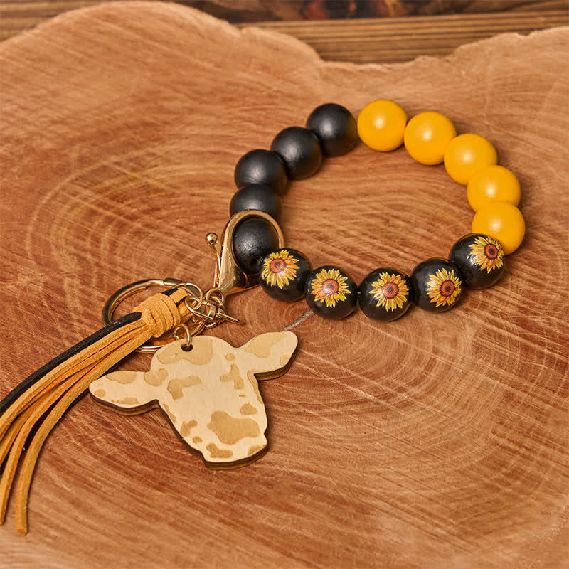 Bracciale da polso in perline di legno di mucca con nappa - Girasole - image 0