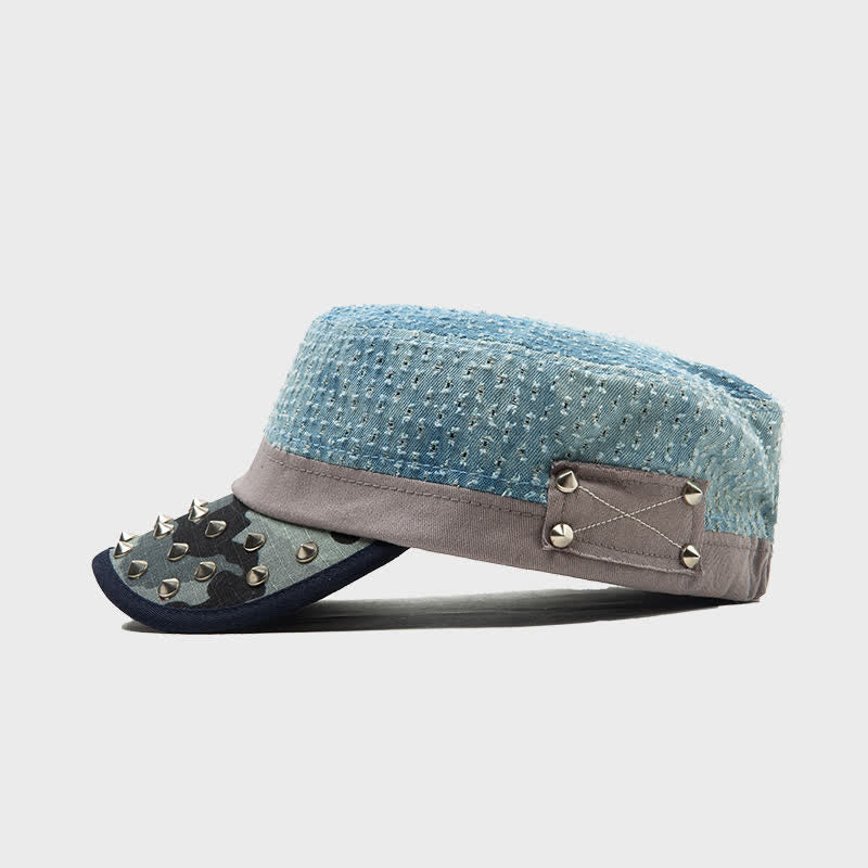 Cappello basco in cotone con rivetti a forma di punta nei toni del blu