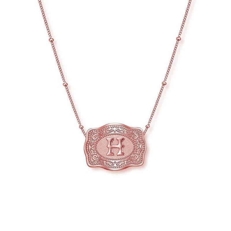 Collana con lettera iniziale in rilievo in oro rosa