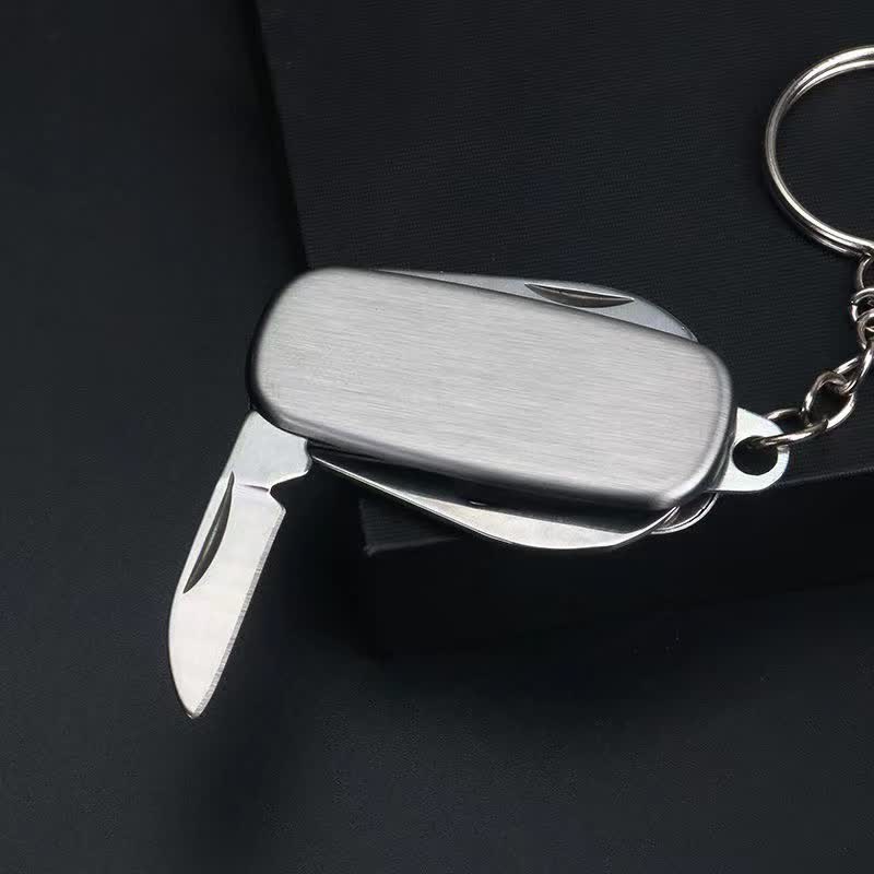 Portachiavi con coltello pieghevole compatto in argento e apribottiglie - image 2