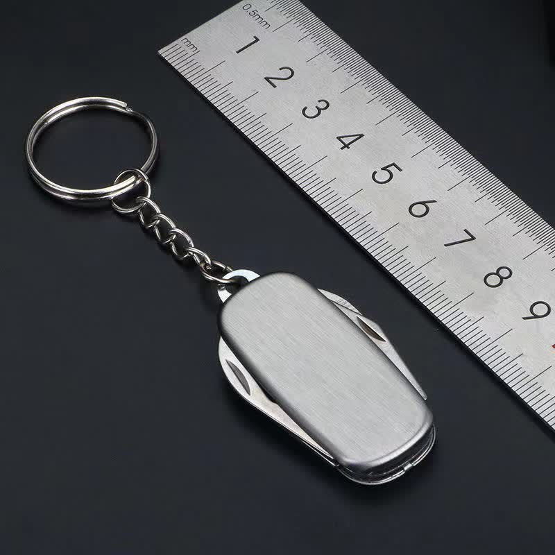 Portachiavi con coltello pieghevole compatto in argento e apribottiglie - image 6