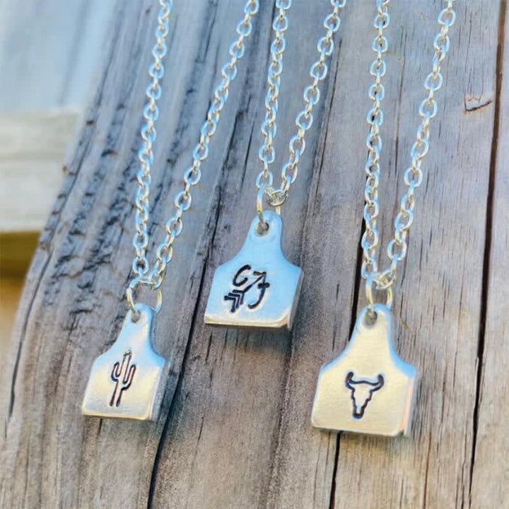 Collana in acciaio inossidabile con iniziale personalizzata in argento con mini targhetta per bovini - image 0