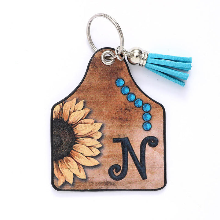 Portachiavi in pelle con nappa a forma di girasole e lettera in stile occidentale - N - image 16