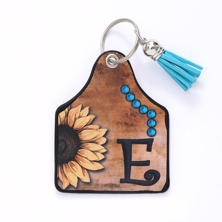 Portachiavi in pelle con nappa a forma di girasole e lettera in stile occidentale - E - image 7