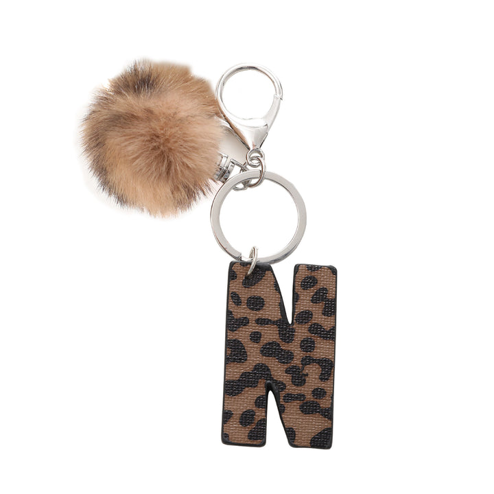 Portachiavi in pelle con lettera stampata leopardata in stile western e palla di peluche - N - image 15