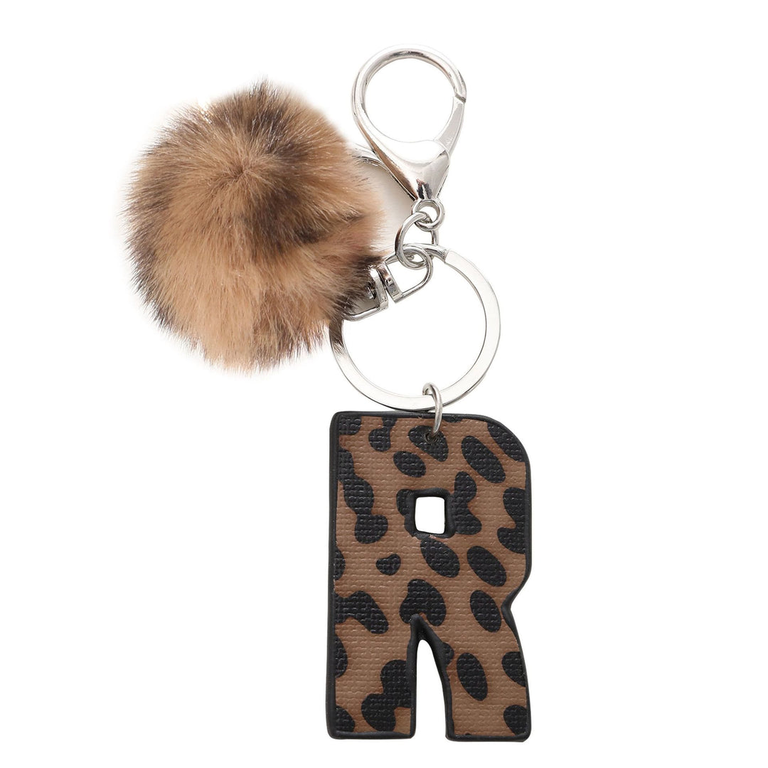 Portachiavi in pelle con lettera stampata leopardata in stile western e palla di peluche - R - image 19
