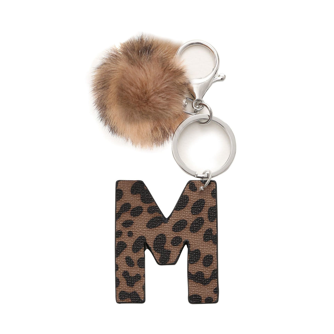 Portachiavi in pelle con lettera stampata leopardata in stile western e palla di peluche - M - image 15