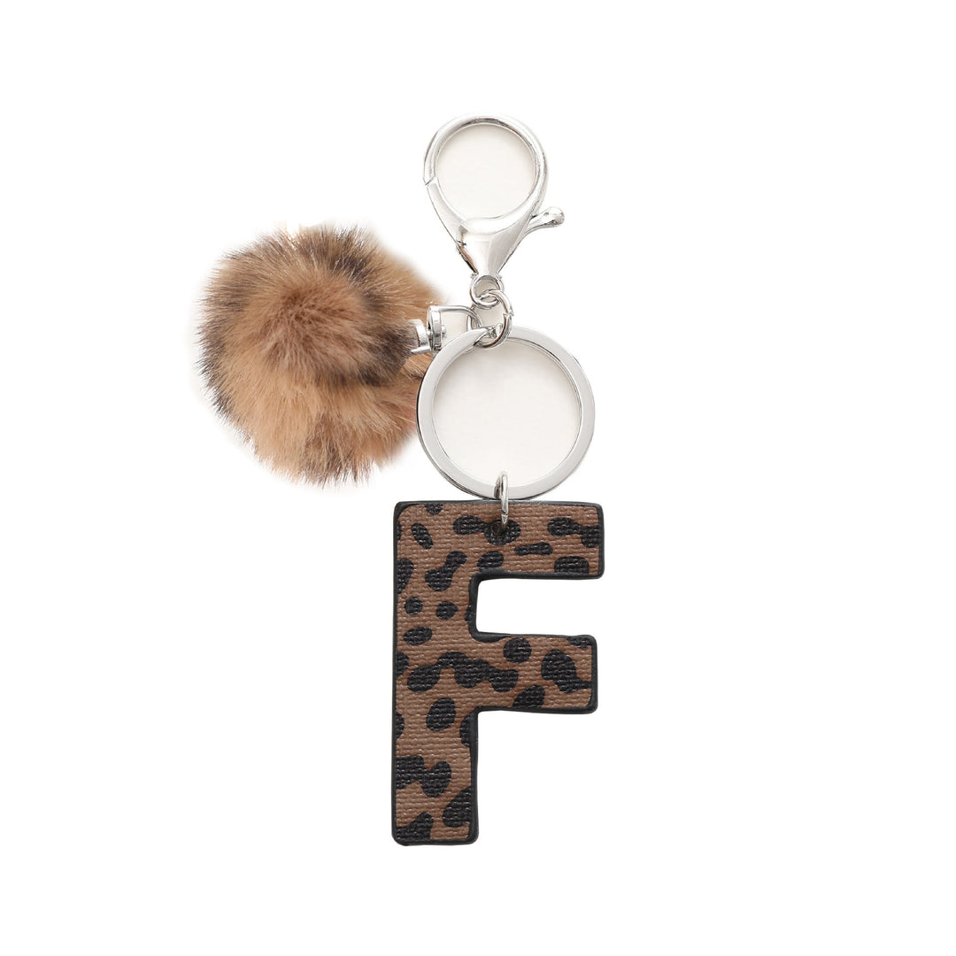 Portachiavi in pelle con lettera stampata leopardata in stile western e palla di peluche - F - image 7